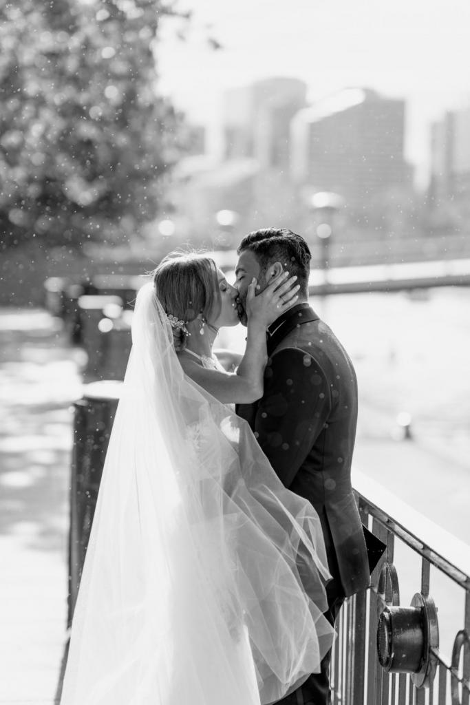 Wedding kisses in the rain