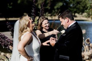 Bride and groom sharing vows during wedding ceremony