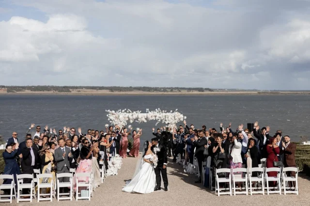 .
That view! 
A timeless celebration of love by the lake, surrounded by cherished family, friends, and the elegance of art deco romance.✨💍

“𝘠𝘰𝘶 𝘴𝘦𝘦 𝘮𝘦 𝘧𝘰𝘳 𝘸𝘩𝘰 𝘐 𝘢𝘮 𝘢𝘯𝘥 𝘸𝘩𝘰 𝘐 𝘤𝘢𝘯 𝘣𝘦𝘤𝘰𝘮𝘦. 𝘠𝘰𝘶 𝘤𝘩𝘢𝘭𝘭𝘦𝘯𝘨𝘦 𝘮𝘦, 𝘴𝘶𝘱𝘱𝘰𝘳𝘵 𝘮𝘦, 𝘢𝘯𝘥 𝘳𝘦𝘮𝘪𝘯𝘥 𝘮𝘦 𝘵𝘩𝘢𝘵 𝘯𝘰 𝘮𝘢𝘵𝘵𝘦𝘳 𝘸𝘩𝘢𝘵 𝘩𝘢𝘱𝘱𝘦𝘯𝘴, 𝘐 𝘸𝘪𝘭𝘭 𝘯𝘦𝘷𝘦𝘳 𝘩𝘢𝘷𝘦 𝘵𝘰 𝘧𝘢𝘤𝘦 𝘢𝘯𝘺𝘵𝘩𝘪𝘯𝘨 𝘢𝘭𝘰𝘯𝘦. 𝘠𝘰𝘶𝘳 𝘭𝘰𝘷𝘦 𝘪𝘴 𝘵𝘩𝘦 𝘨𝘳𝘦𝘢𝘵𝘦𝘴𝘵 𝘨𝘪𝘧𝘵, 𝘢𝘯𝘥 𝘐 𝘸𝘪𝘭𝘭 𝘤𝘩𝘦𝘳𝘪𝘴𝘩 𝘪𝘵 𝘢𝘭𝘸𝘢𝘺𝘴”

Photography: @shevan_j_photography
Film: @stuartvideoproductions
HMUA: @glam.by.becks
Venue @campbellpointhouse
Celebrant: @melbournecelebrant_meriki
.

.

.
#LakesideWedding #ArtDecoElegance #foreverbeginshere #weddingmoments #gettingmarried #celebrant 
#bellarinepeninsulawedding #marriagecelebrantmelbourne #marriagecelebrants #weddingphotography 
#melbourneweddingcelebrant 
#weddingplanning #weddinginspo  #weddingday #marriageceremony #weddingceremony